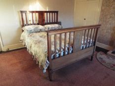 A king size bed measuring approximately