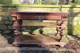 An open sideboard with single frieze dra