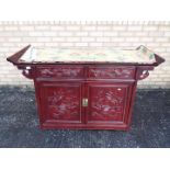 A altar cabinet style sideboard with bra