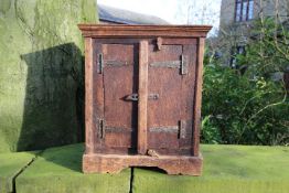 A small twin door cupboard, approximatel