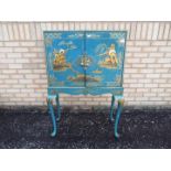 A Chinoiserie drinks cabinet with brass