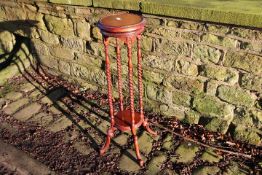 A torchere / plant stand with barley twi