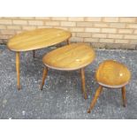 An Ercol Pebble nest of three tables, la