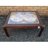 A coffee table with map image to the top