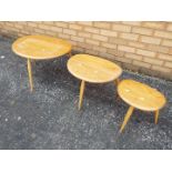 An Ercol Pebble nest of three tables, la