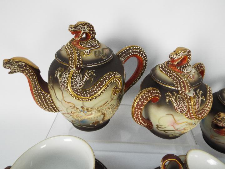 A collection of Oriental tea wares with dragon decoration. - Image 2 of 8