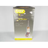 A Vax Rapide Spring Clean lightweight carpet washer, contained in original box.