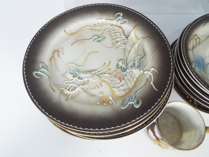 A collection of Oriental tea wares with dragon decoration. - Image 4 of 8