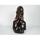 Ethnographica - A large, carved hardwood tribal bust, approximately 43 cm (h).