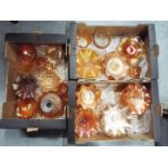 Carnival Glass - A large collection of orange carnival glass to include, bowls, footed dishes,