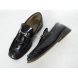 A pair of Gucci slip on shoes, size 42½ E (8½).