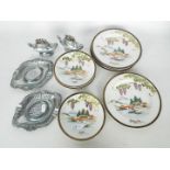 Hand painted Japanese plates and saucers decorated with landscape scenes by Kutani NS,