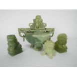 Chinese carved stone items to include Buddhist lions and a censer and cover,