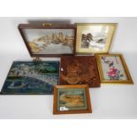 A collection of Asian wall art to include cork dioramas, embroidery, wooden carving and similar.
