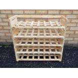 A five tier pine wine rack.