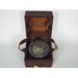 A wood cased military issue Medium Landing Compass, stamped with broad arrow and 6B/34,