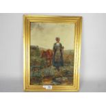 Framed oil on board depicting a young lady leading a calf, signed lower right Yeend King,