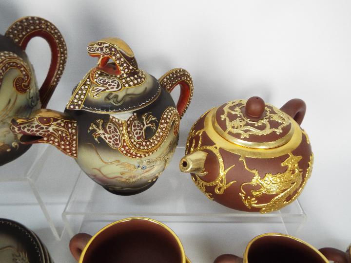 A collection of Oriental tea wares with dragon decoration. - Image 3 of 8