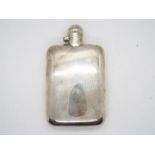 A George V silver hip flask, monogrammed A.B.