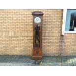 An early 20th century oak cased longcase