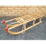 A vintage Pilz Davos wooden sledge, 110