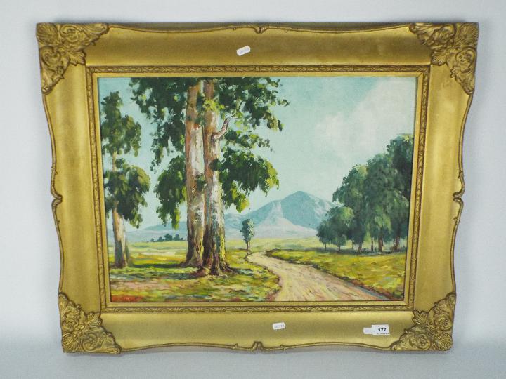 A large framed oil on board landscape sc