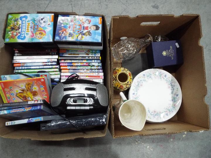 A mixed lot to include DVDs, DVD player,