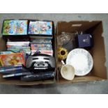 A mixed lot to include DVDs, DVD player,