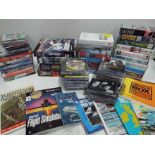 A quantity of CD's, DVD's, videos, books