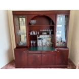 A large open drinks cabinet with central