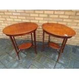 Two oval topped mahogany occasional tabl