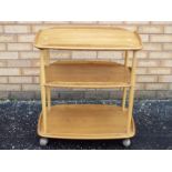 An Ercol three tier hostess trolley, app