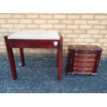 A hinge top piano stool, 51 cm (h) and a