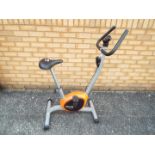A Body Fit exercise bike, 114 cm (h)