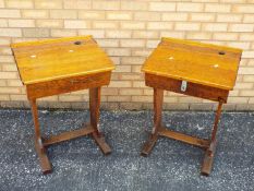 Two traditional school desks with hinge