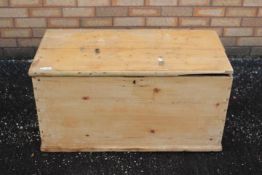 A pine chest measuring approximately 46