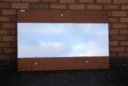 A vintage wall mirror, approximately 70