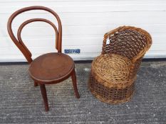 Two children's chairs, one a wicker tub