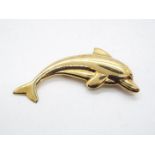 A 9 carat gold brooch in the style of a dolphin, Sheffield assay, approx weight 11.