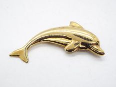 A 9 carat gold brooch in the style of a dolphin, Sheffield assay, approx weight 11.