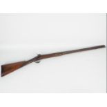 A single barrel percussion 12 gauge shotgun, 79 cm barrel with ramrod and working action,