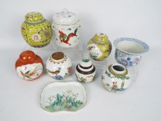 A collection of Chinese ceramics to include ginger jars, floral decorated bowl with flared rim,