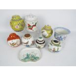 A collection of Chinese ceramics to include ginger jars, floral decorated bowl with flared rim,