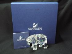 Swarovski - A boxed figurine from the Rare Encounters series, Mother Bear, with certificate.