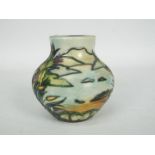 Moorcroft - A small Moorcroft Pottery vase of squat form decorated in the Islay pattern,