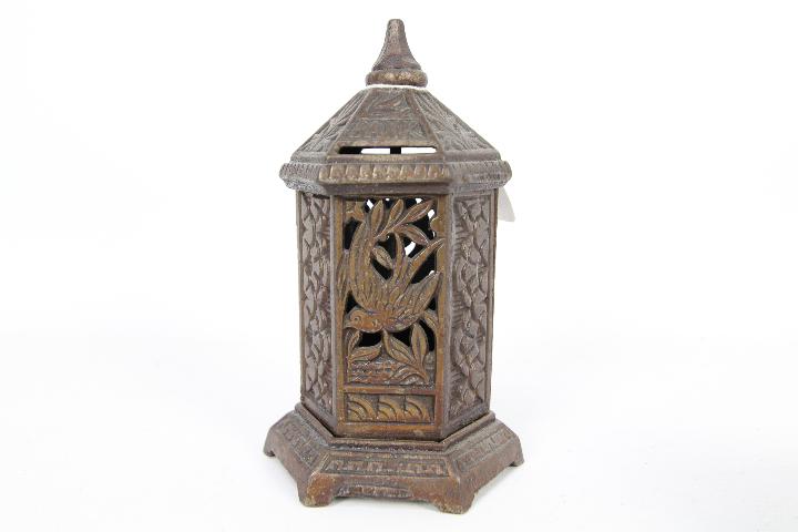 A Victorian cast iron money bank of hexagonal section, pierced decoration of birds and foliage, - Image 2 of 3