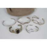 Costume Jewellery - five cuff bracelets, three unmarked presumed silver,