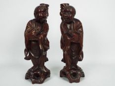 Two Chinese hardwood carvings, approximately 37 cm (h).