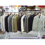 A collection of gentleman's clothing to include a beige linen 54 single breast jacket by Feraud.