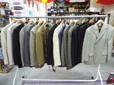 A collection of gentleman's clothing to include a beige linen 54 single breast jacket by Feraud.
